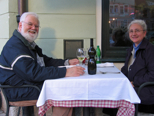 At our table outside Zlata Ribica, with a wasp-waisted bottle of 